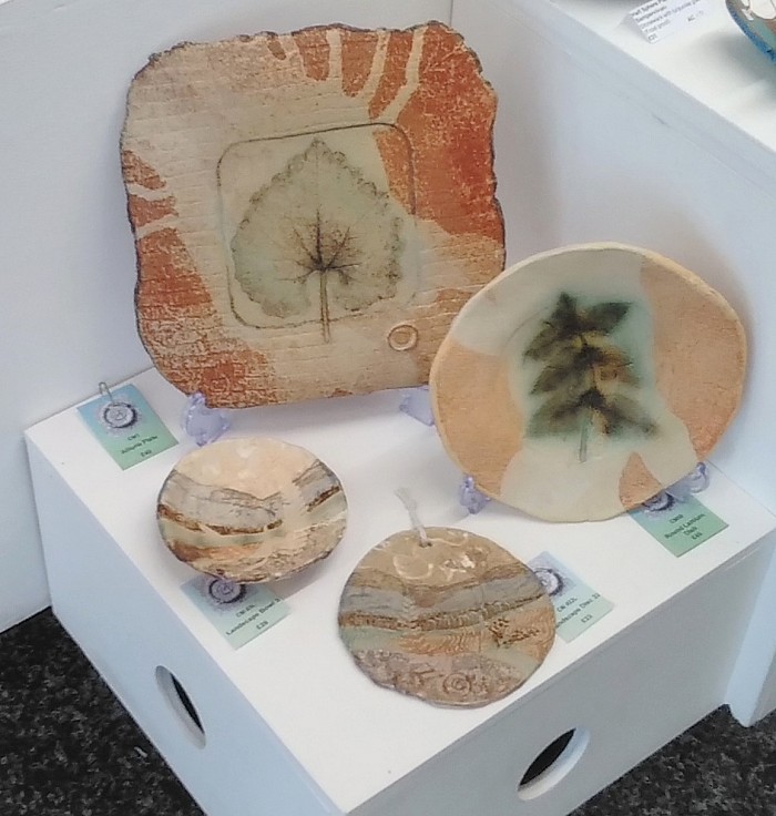 ash glaze stoneware plant plates and small landscape pieces